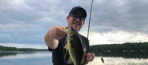 Jason Dworshak with a largemouth bass (Micropterus salmoides)